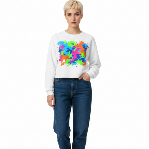 Person wearing a white sweatshirt with a colorful pattern and blue jeans on a white background