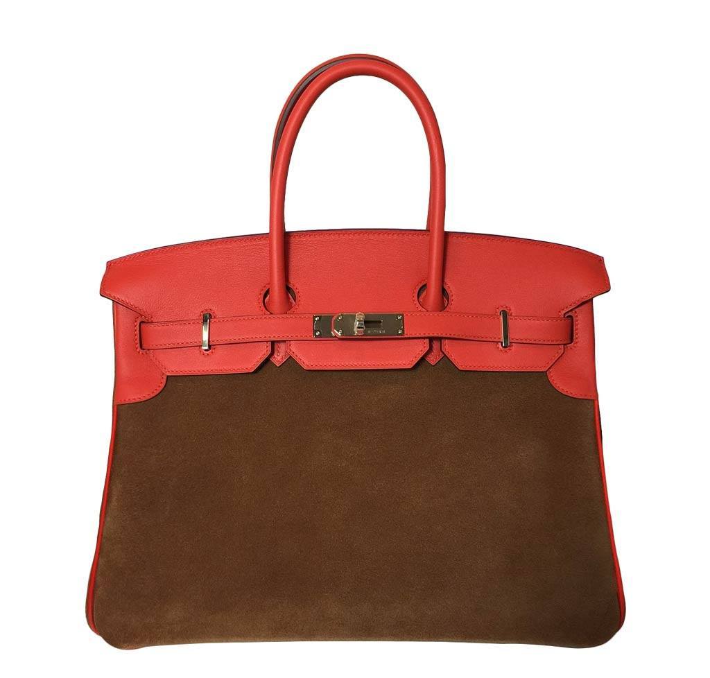 Red and brown handbag with gold hardware on a white background