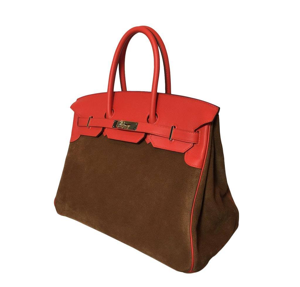 Red and brown handbag on a white background