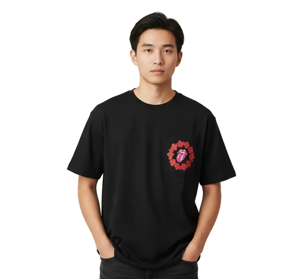 Person wearing a black t-shirt with a red and pink design on a white background