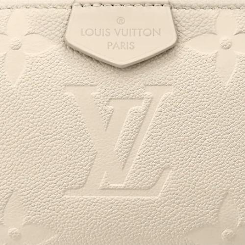 The two removable pochette components of the bag laid out