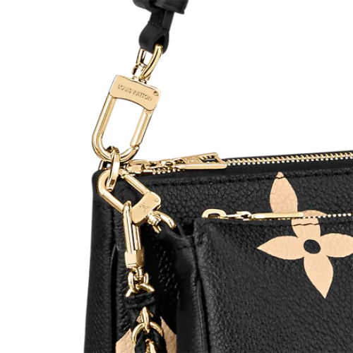 The small removable pouch being used as a clutch