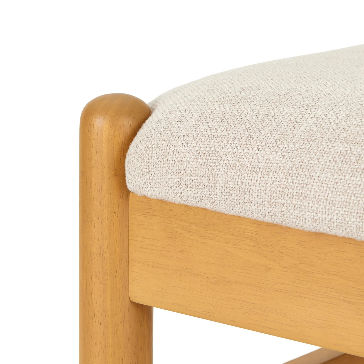 Close-up of a wooden chair with a beige cushion on a white background