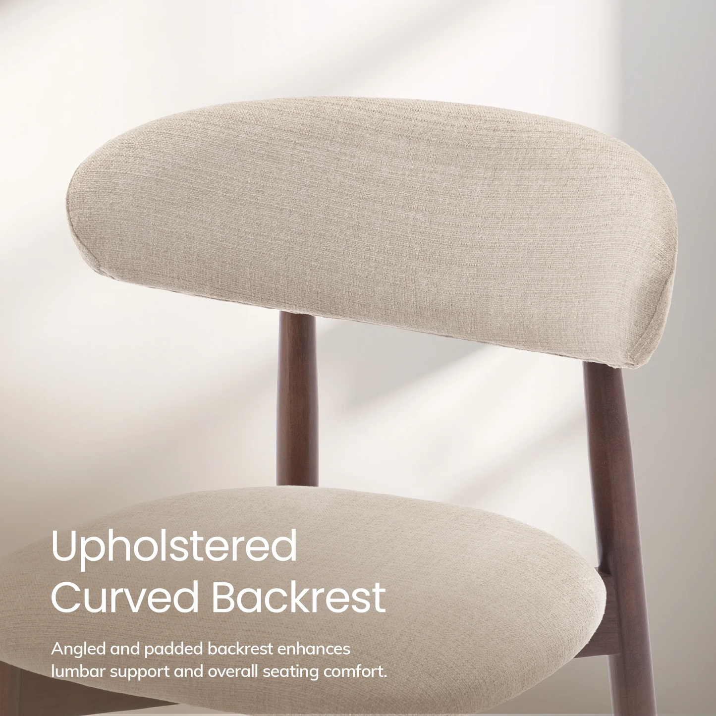 Chair with upholstered curved backrest on a light background