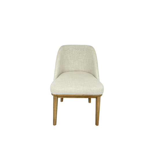 Beige upholstered chair with wooden legs on a white background